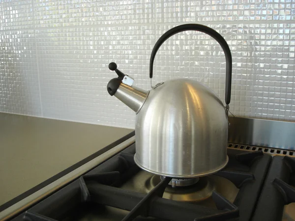 Kettle on the stove Stock Photo