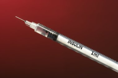Insulin syringe with medicine clipart