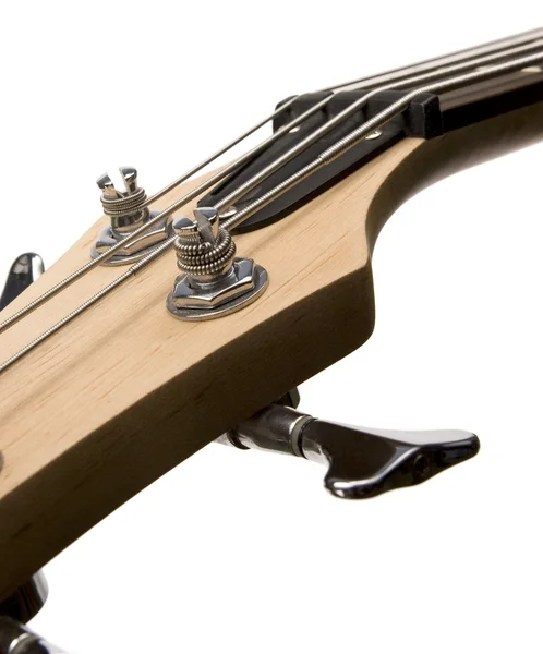 Bass guitar fingerboard head with pins and strings — Stock Photo, Image