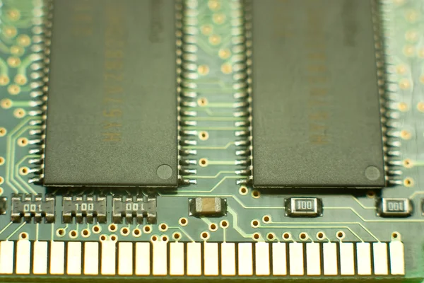 Computer chips on circuit board with connector — Stock Photo, Image