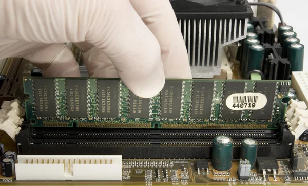 Installing RAM memory into motherboard — Stock Photo, Image