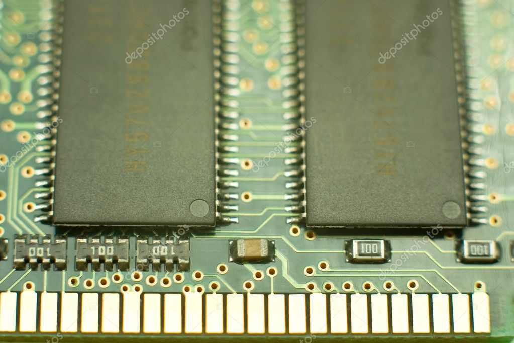 Computer chips on circuit board with connector — Stock Photo