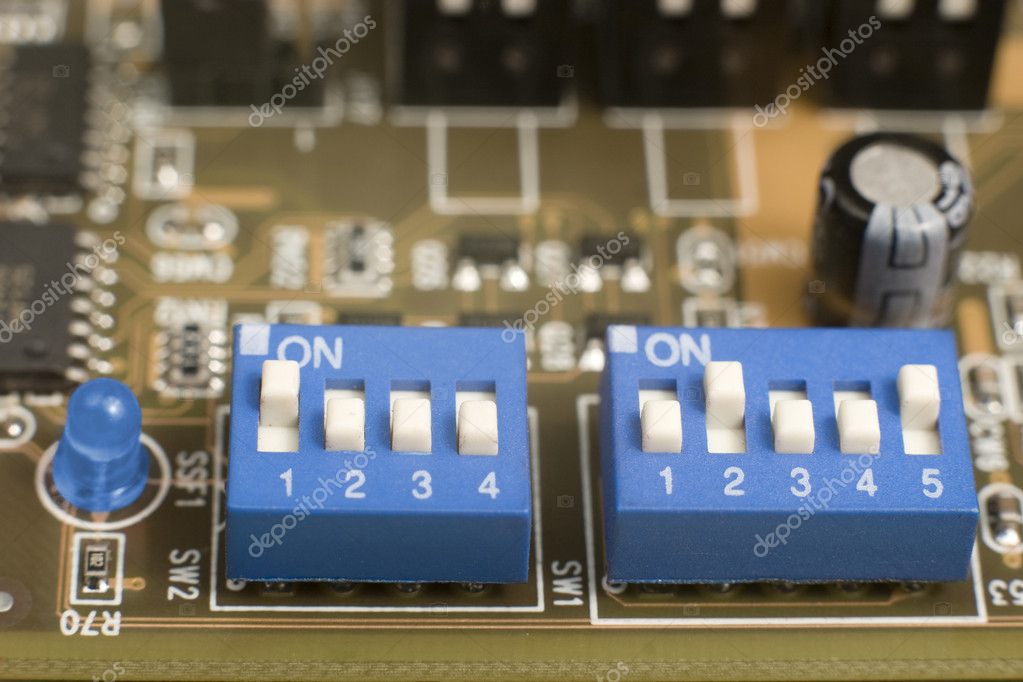 Upward Stare boat Blue switches on circuit board Stock Photo by ©Yourluckyphoto 6189397