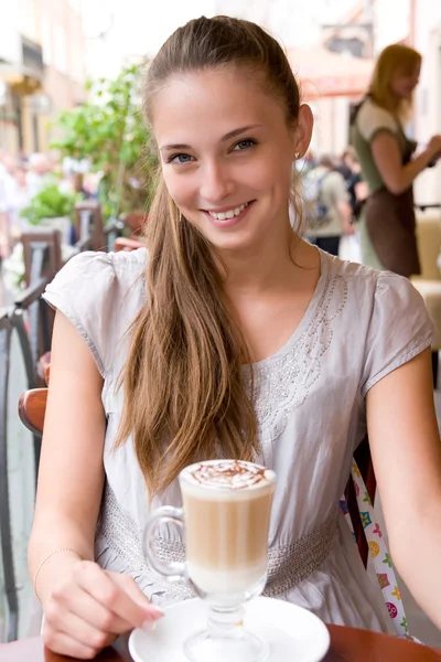 Woman with coffee in cafe — Stock Photo, Image