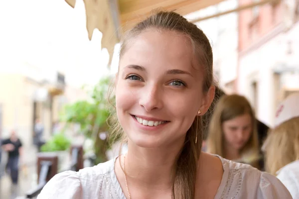 Smiling woman in cafe — Stock Photo, Image