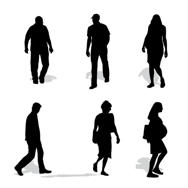 Homens e mulheres caminhando, silhuetas vetoriais — Vetor de Stock