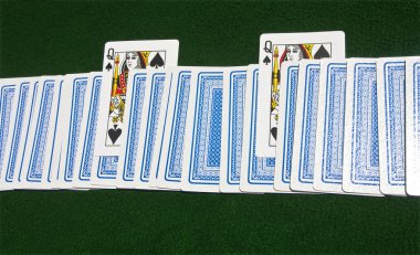 Deck of cards with two Queens of Spades clipart