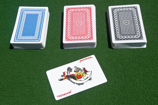 Three decks of cards with a joker — Stok fotoğraf