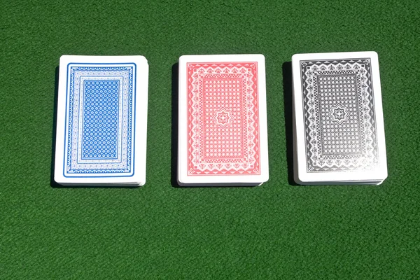 Three decks on playing table — Stock Photo, Image