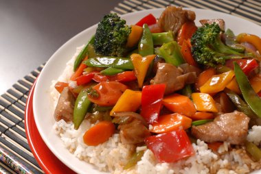 Close up of a plate of stir fry pork clipart