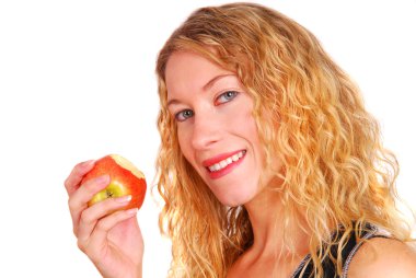 Healthy young woman eating an apple clipart