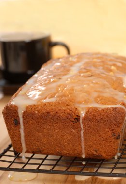 Cherry and raisin bread with lemon icing clipart