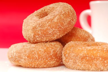 Apple cinnamon doughnuts with coffee clipart