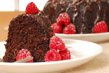 Chocolate fudge cake with raspberries clipart
