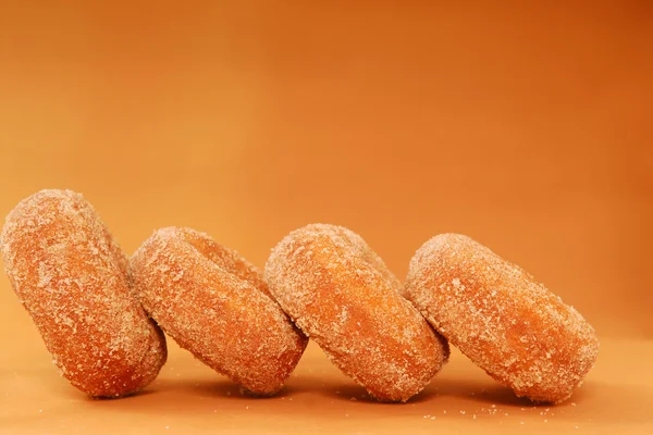 Freshly baked apple cinnamon doughnuts — Stock Photo, Image