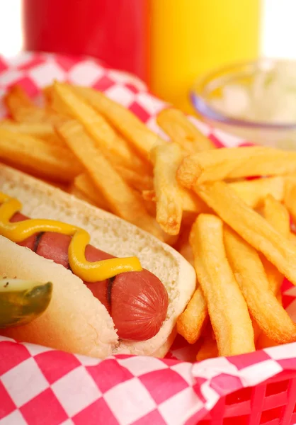 Hot dog with french fries — Stock Photo, Image