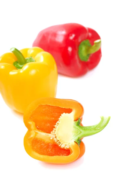 Orange, yellow and red bell peppers — Stock Photo, Image