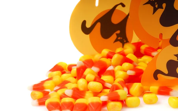 Halloween candy corn spilling out of a box — Stock Photo, Image
