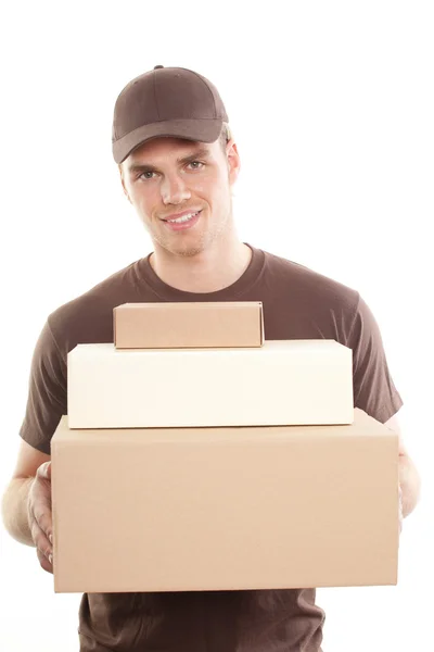 A delivery man is — Stockfoto