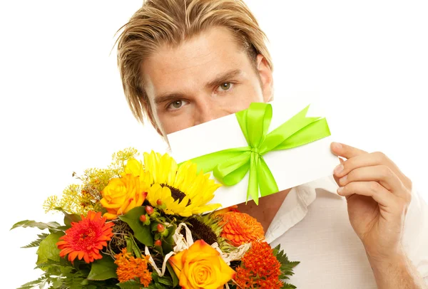 Man with coupon in front of his face — Stock Photo, Image