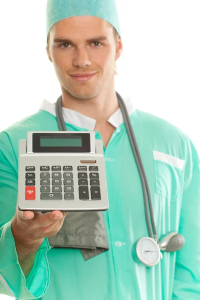 Läkare med miniräknare Stockbild