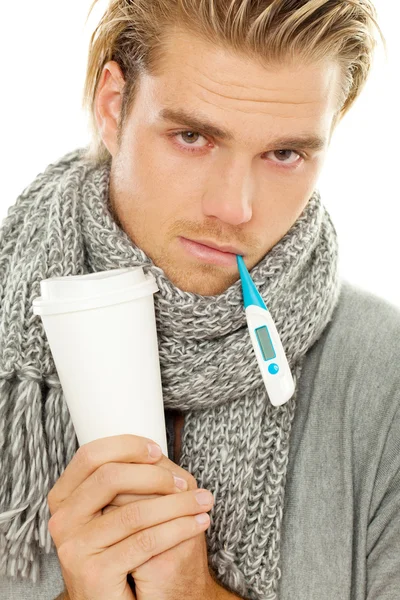 Man with cup and thermometer — Stock Photo, Image