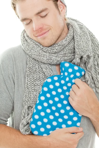Holding a heating pad — Stock Photo, Image