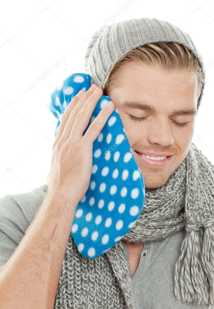 Man with heating pad