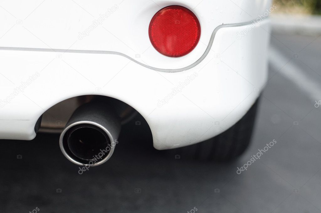Exhaust Pipe of a White Car