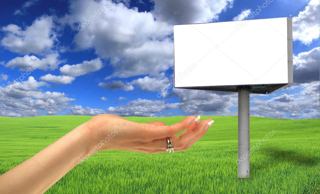 Blank billboard in beautiful landscape scenery with women hand