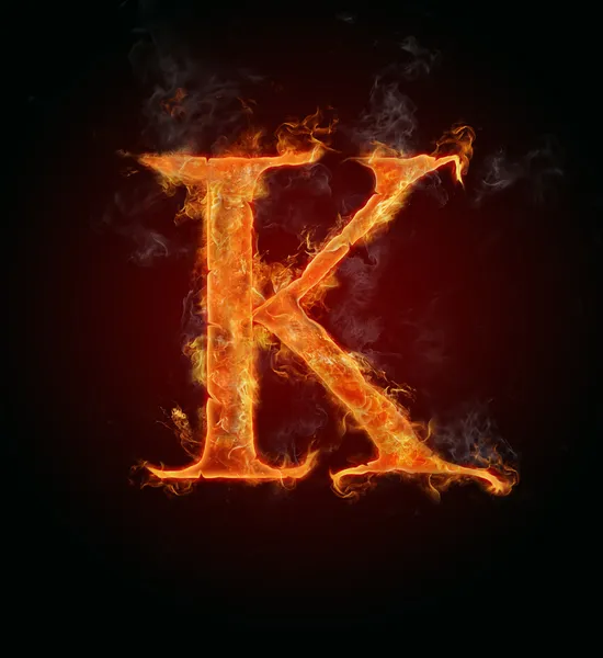 Пылающий шрифт, буква K — стоковое фото