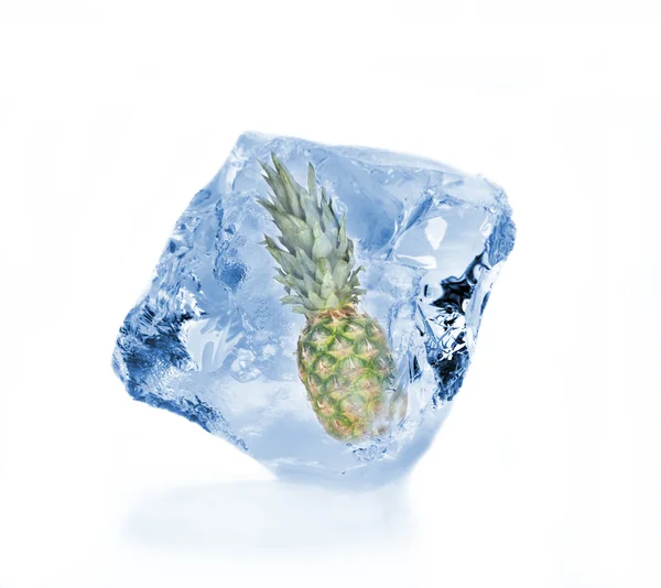 Pine-apple frozen in ice cube — Stock Photo, Image