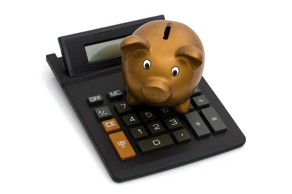 Calculator with a coin bank — Stock Photo, Image