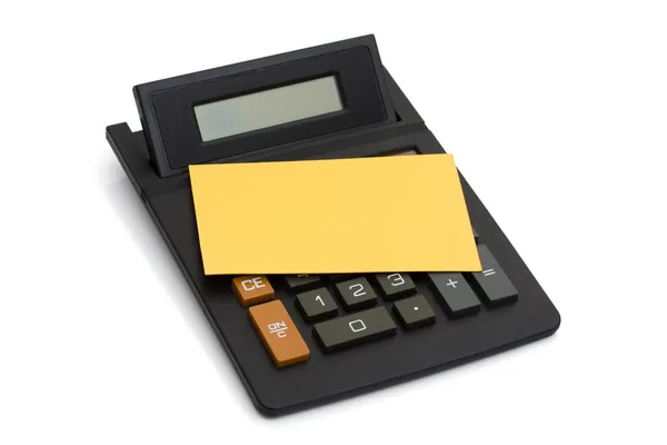 Calculadora con nota amarilla —  Fotos de Stock