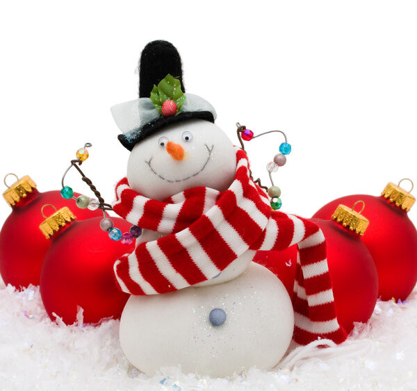 Snowman with red glass Christmas balls on snowflake background, Christmas Time