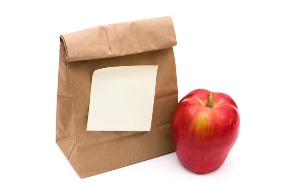 Hnědý papírový sáček oběd — Stock fotografie
