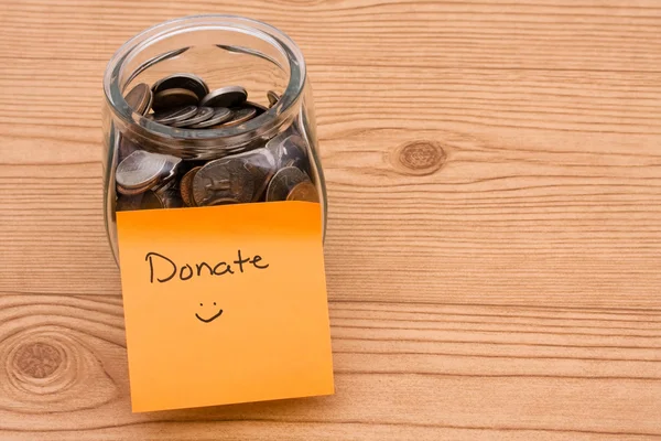 Gelieve te helpen door het doneren van geld — Stockfoto