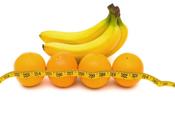 Sinaasappelen en bananen — Stockfoto