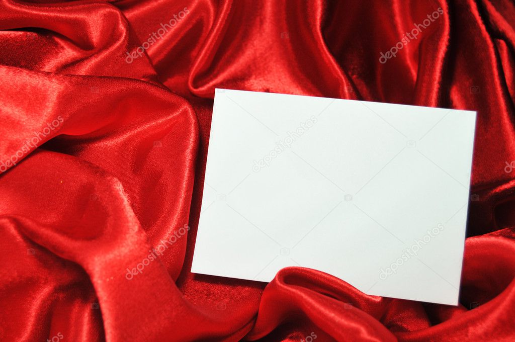 Blank card on red silk