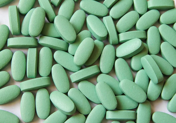 Pílulas verdes Imagem De Stock