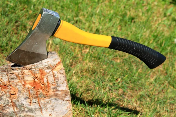 stock image Axe have thrust in a log