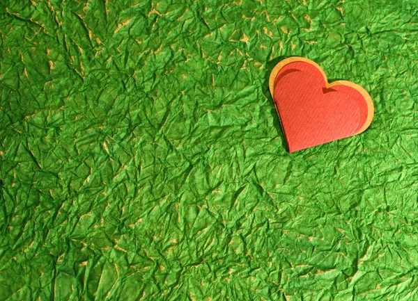 Red heart on Green — Stock Photo, Image