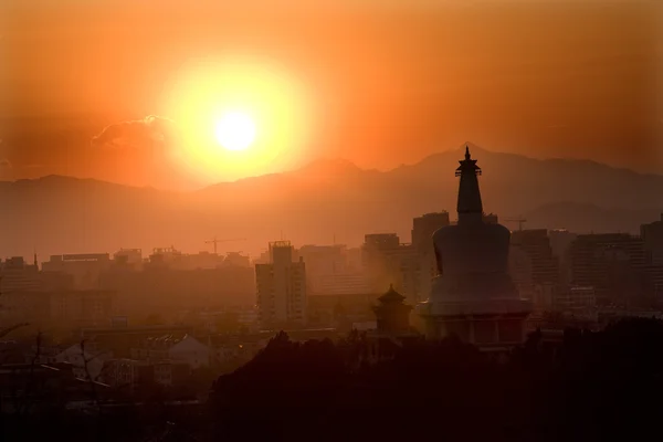 stock image Beihai Stupa with Sunset and Mountains Beijing China