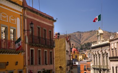 Colorful Street with Flags Guanajuato Mexico clipart