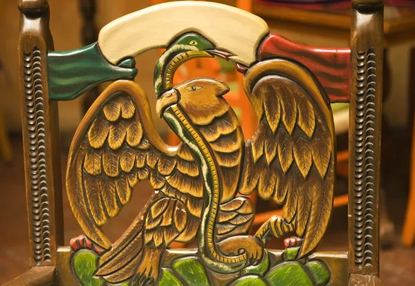 stock image Wooden Carved Chair Symbol of Mexico Eagle Holding Snake