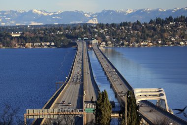 I-90 Bridge Seattle Mercer Island Snowy Cascade Mountains Washin clipart