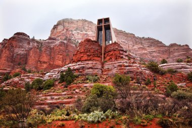 Chapel of Holy Cross Red Rock Canyon Rain Clouds Sedona Arizona clipart