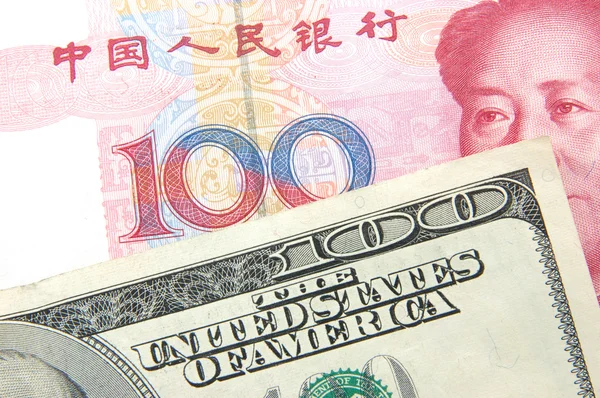 Доллар США против юаня — стоковое фото