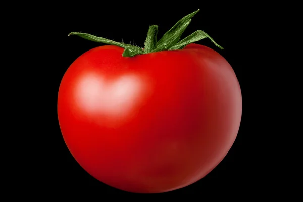 Czerwony pomidor na czarnym tle — Zdjęcie stockowe