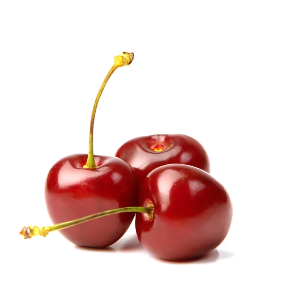 Three cherries on a white background — Stock Photo, Image